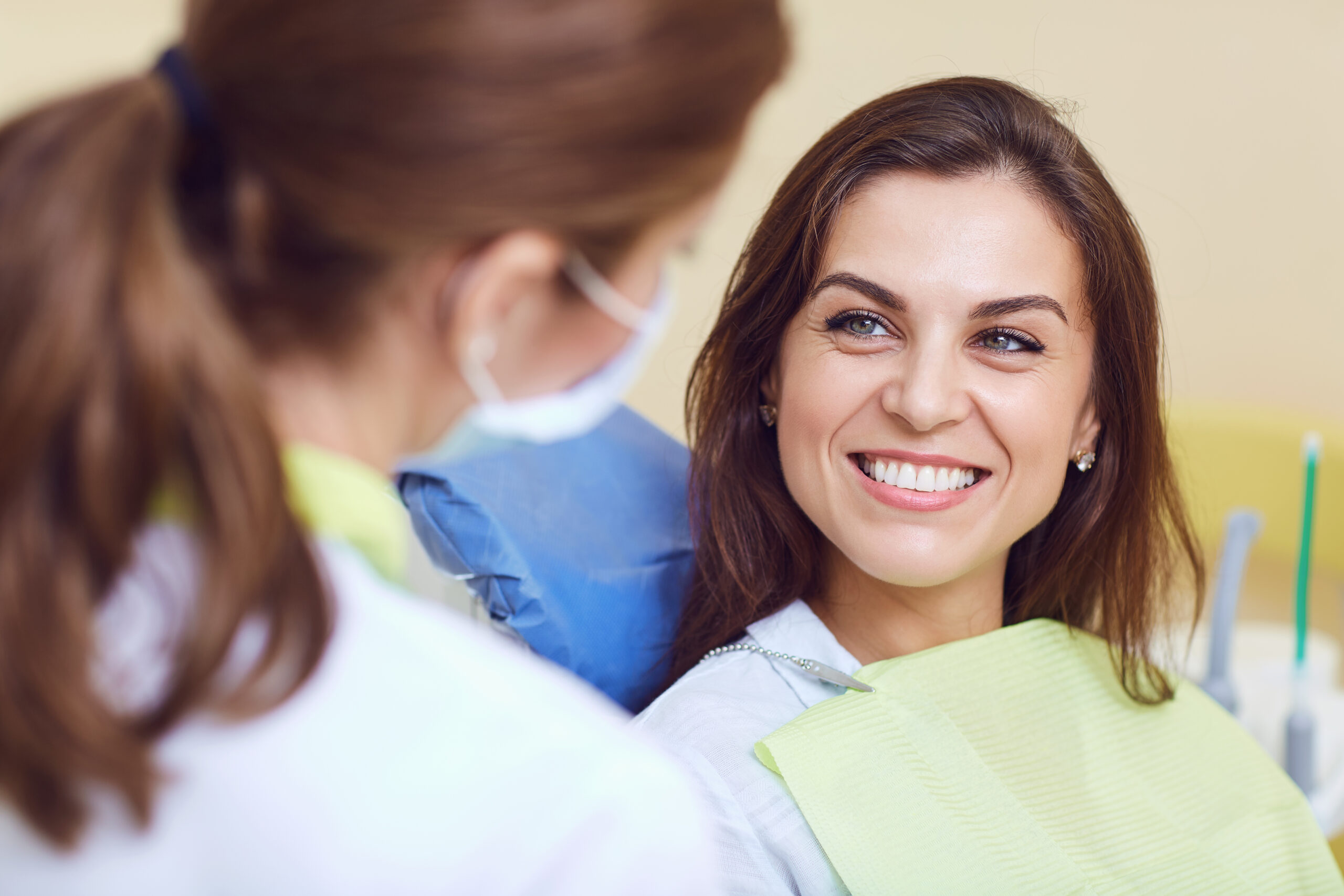 A girl and a dentist in a dental clinic