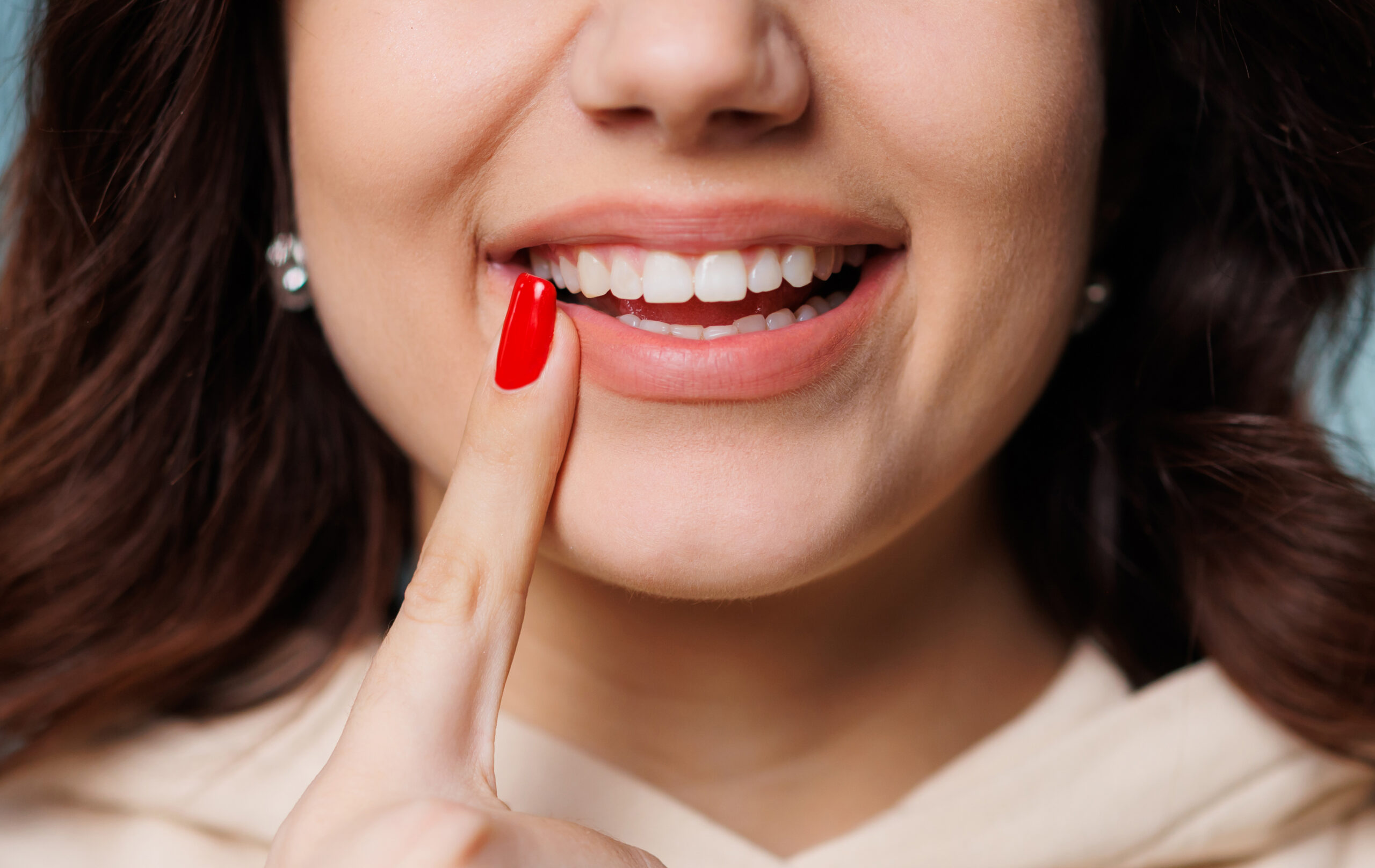 happy girl showing toothy smile pointing finger a 2026 03 15 23 32 15 utc